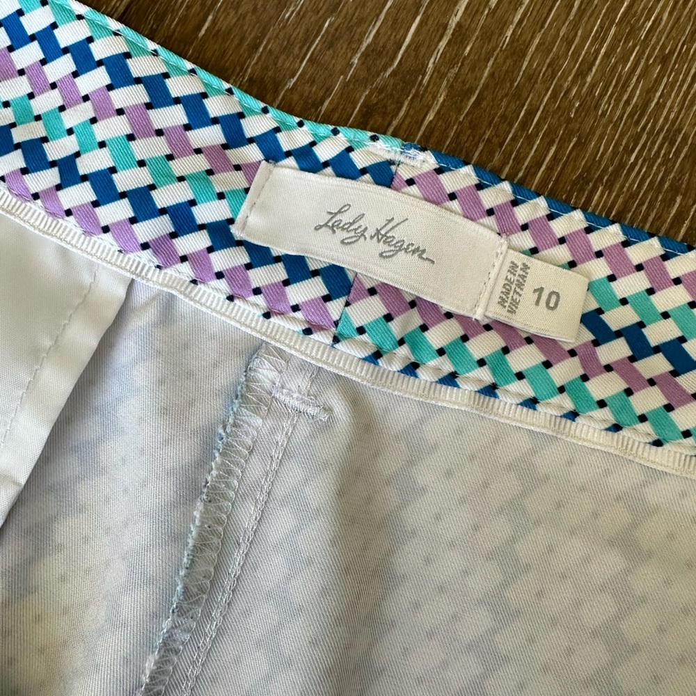 Lady Hagen, size 10, aqua, purple, white and navy pattern gold shorts. - Picture 3 of 4